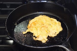 Cooking the eggs in the same pan