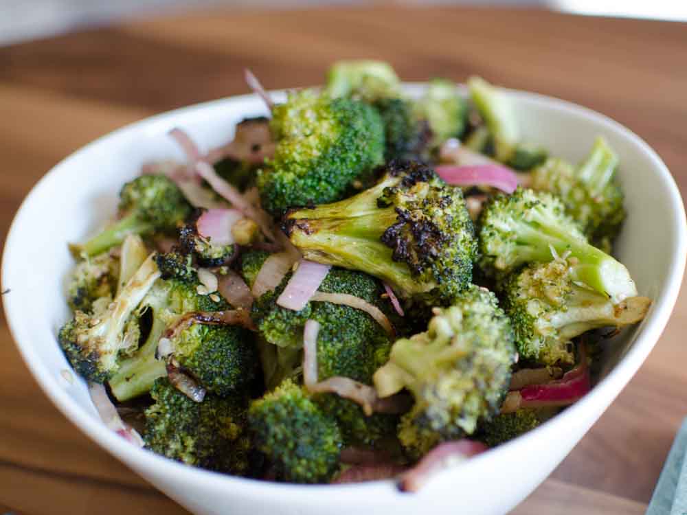 White Bowl with Grilled Broccoli and Red Onions