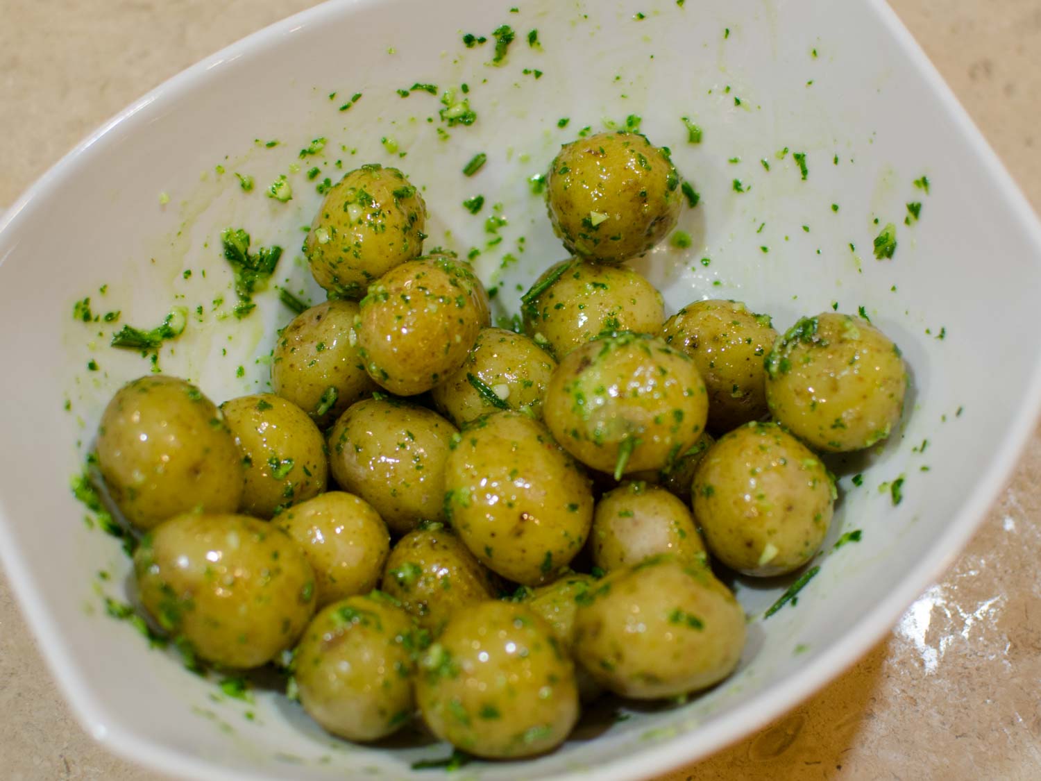 Baby Potatoes Coated with Garlic, Rosemary and Parsley Oil