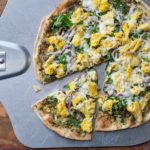 Flatbread pizza on a peel